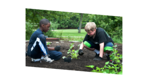 two youths plating in garden