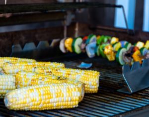 corn and vegetables on grill