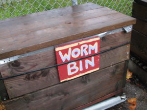 wooden box with words worm bin