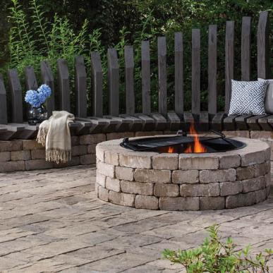 concrete pavers & lit fire pit on patio