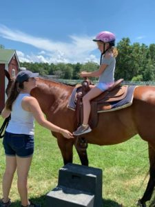 girl riding a horse