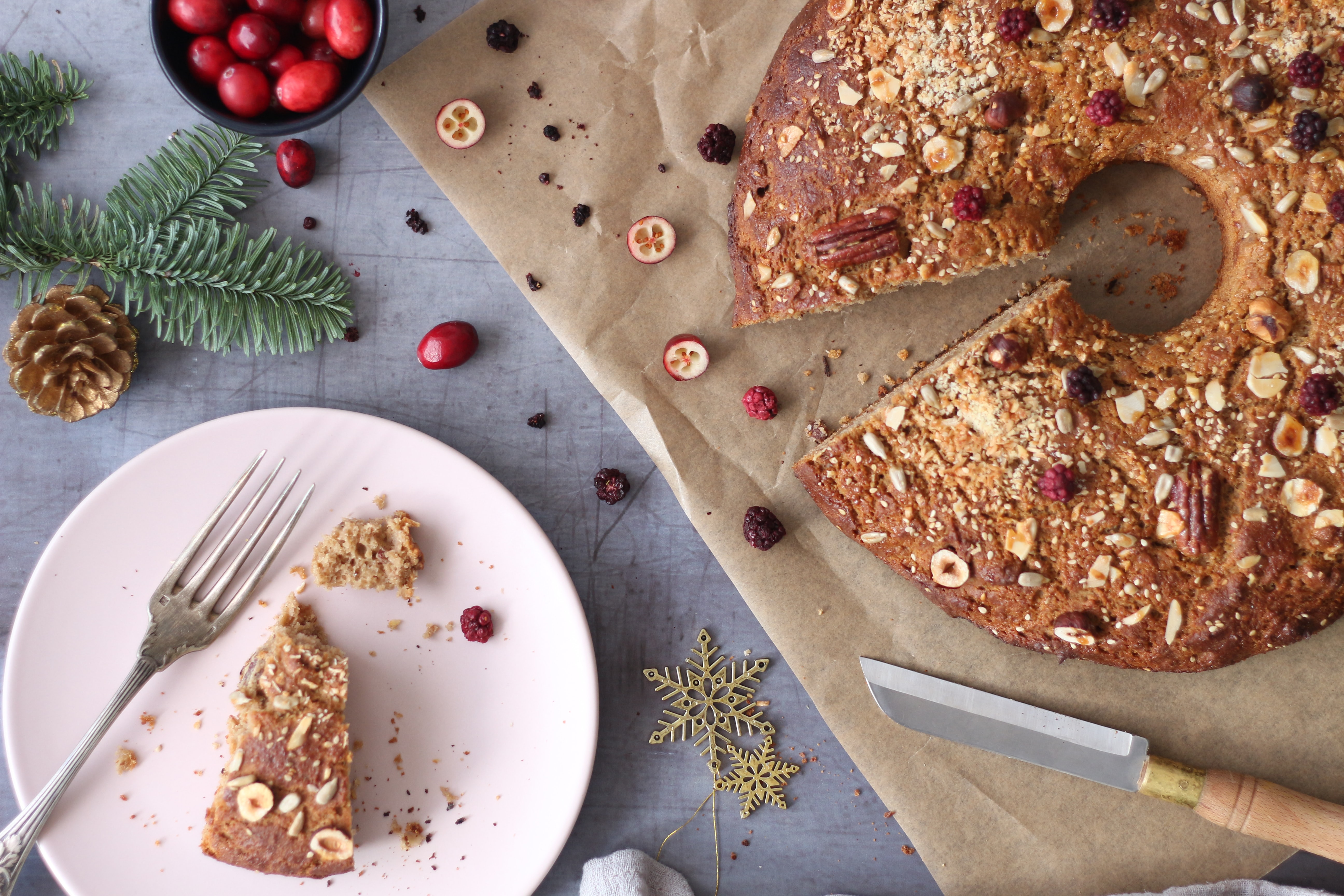 holiday cranberry cake and slice on plate