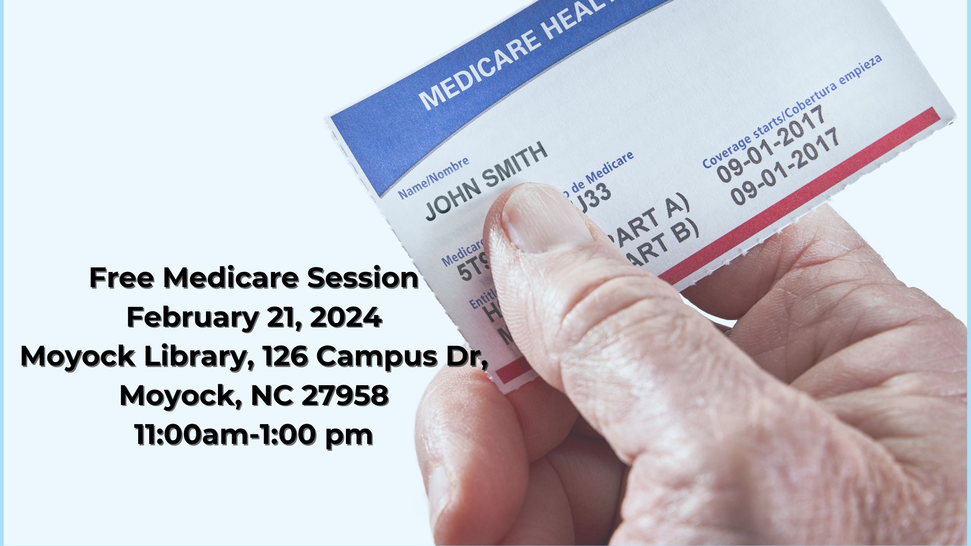 Medicare card being held in a hand