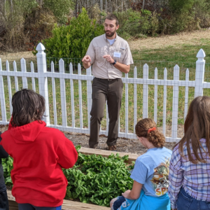 Agriculture agent teaching kids