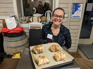 Olivia Patchel with baked bread